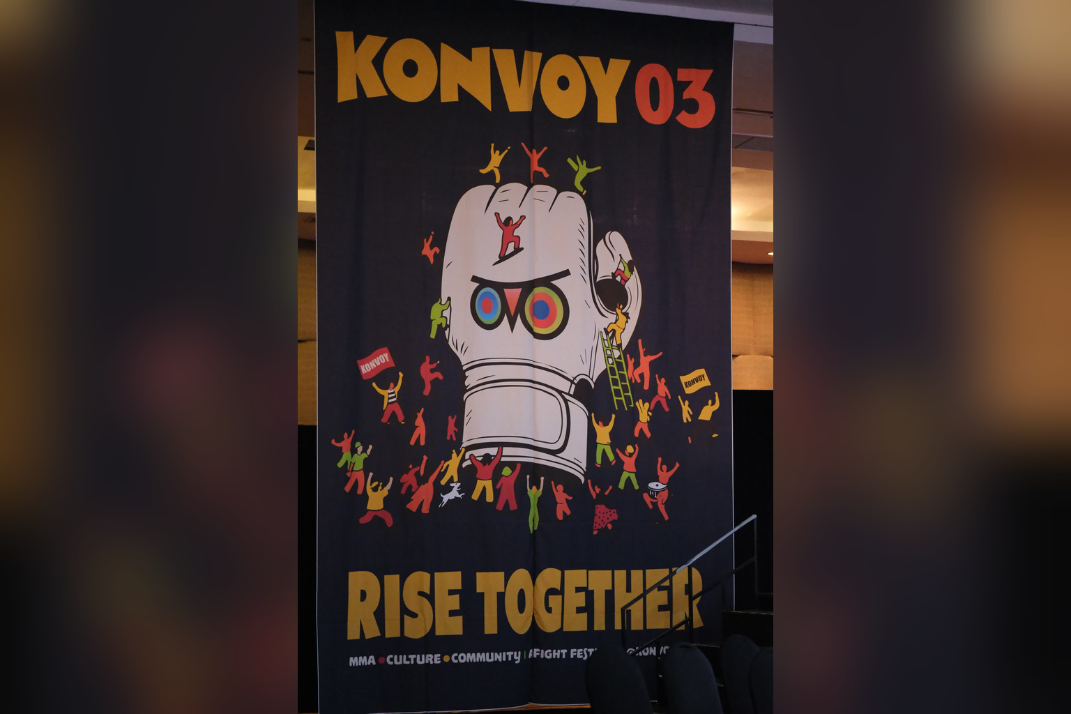 A Konvoy 03 banner displays a boxing glove illustration and the words Rise Together.